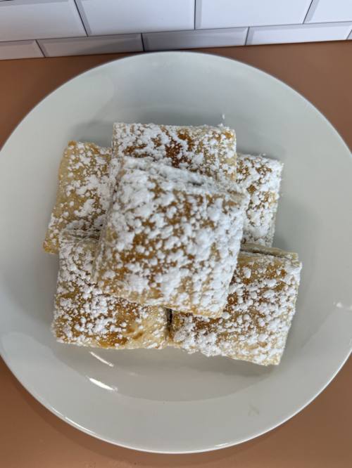 Peruvian milhojitas layered and dusted with powdered sugar