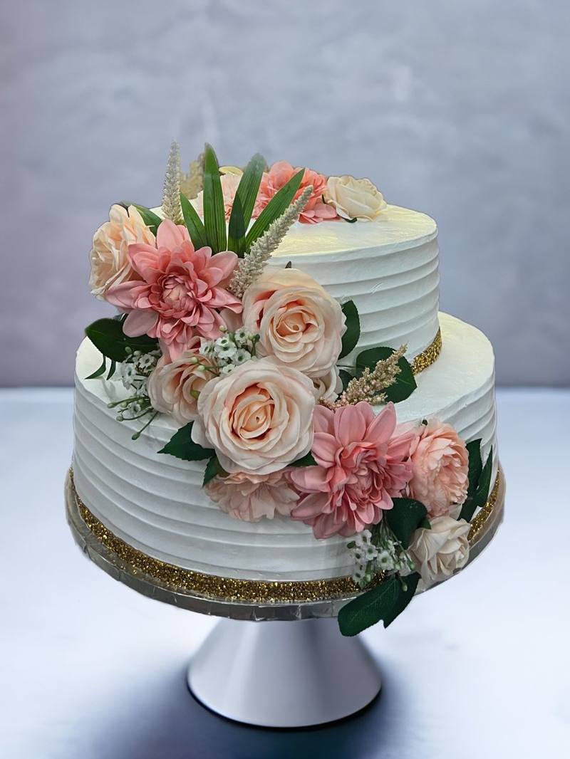 Two tier wedding cake with peach roses by Cakes by Steph